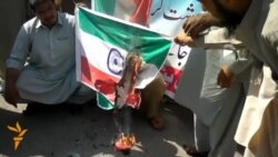 Pakistanis Burn Indian Flag After Border Shooting