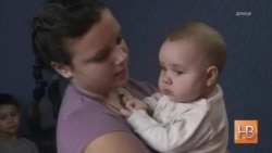 Ціна війни на Донбасі. Мати врятувала дитину, накривши своїм тілом