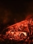 A firefighter (center left) works under the light of a burning building after strikes on Zaporizhzhya on August 11.<br><br>A missile and drone attack on the city included a strike on a metalworking plant that <a href="https://www.reuters.com/world/russian-attack-kyiv-triggers-fires-officials-say-2026-08-10/" class="wsw__a"><strong>killed seven people</strong></a>. Ukrainian President Volodymyr Zelenskiy <a href="https://x.com/ZelenskyyUa/status/2087074026862551536" class="wsw__a"><strong>claimed</strong></a> Russia used North Korean ballistic missiles in the Zaporizhzhya strikes.<br>