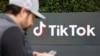 TikToker and "newsfluencer" Joe Andaloro films a TikTok video outside the U.S. headquarters of TikTok in Culver City