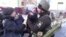 Украинский полицейский прощается с сыном