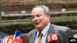 Noul ministru de externe al Greciei, Nikos Kotzias, la sosirea astaăzi la Bruxelles 