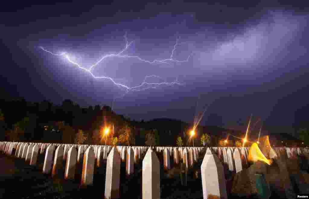 Lightning strikes during a storm over the Potocari cemetery the night before the July 11 mass burial.