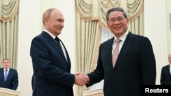 Președintele rus, Vladimir Putin, și premierul chinez, Li Qiang, s-au întâlnit la Moscova. 