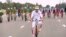 Turkmen President Gurbanguly Berdymukhammedov rides his bike in Ashgabat on June 1 as part of a mass ride that set a Guinness world record.
