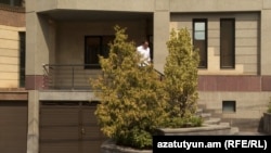 Armenia - Opposition leader Narek Karapetian emerges from his house after it was searched by investigators, Yerevan, July 31, 2026.