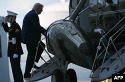 US President Donald Trump boards Marine One at Joint Base Andrews in Maryland on June 19 en route to Camp David.