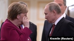 Njemačka kancelarka Angela Merkel i ruski predsjednik Vladimir Putin tokom zajedničke konferencije za medije u Moskvi, januar 2020. 