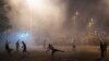 Armenia - Demonstrators who had gathered in a show of support for gunmen holding several hostages in a police station, clash with riot police in Yerevan, Armenia, July 20, 2016