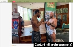 Bărbatul cu barbă roșcat apare într-o fotografie de la un turneu de box, pe un blog militar.