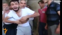 Video Shows Father Reunited With Son After Syrian Attack