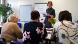 Russian speakers attend a Latvian language class in Riga in May 2023.