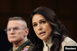 The diector of US National Intelligence, Tulsi Gabbard, testifies before a Senate Intelligence Committee hearing in Washington on March 18.