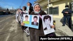 Qalida Akytkhan (center) takes part in a protest near the Chinese Consulate in Almaty in early March.