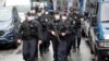 French soldiers at the scene of a knife attack near the former offices of satirical newspaper Charlie Hebdo in Paris on September 25.