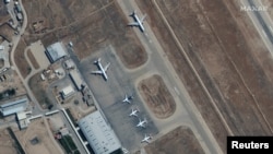 A view of Mazar-e Sharif's airport shows commercial airplanes near the main terminal in early September.