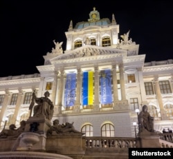 A Ukrainian banner flag hanging on the facade of the Czech Republic's National Museum on May 2023.