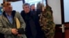 Adamkul Junusov (center) was extradited from Azerbaijan on December 28.