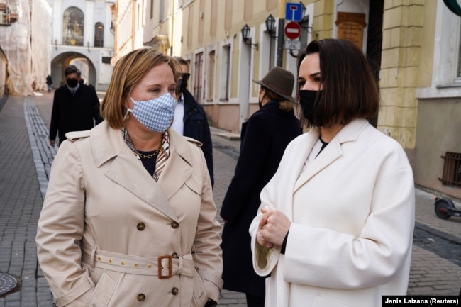 U.S. Ambassador to Belarus Julie Fisher talks with opposition leader Svyatlana Tsikhanouskaya in Vilnius on April 21.