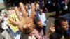 'Four-Finger Salute' Shows Solidarity With Egypt's Muslim Brotherhood