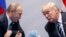 Президент США Дональд Трамп и президент России Владимир Путин, июль 2017 года