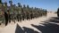 Afghan commandos attend a graduation ceremony after military training in Herat.