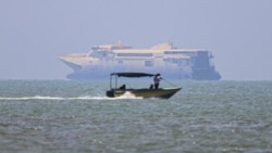 Vessels in the Strait of Hormuz near the beach of Bandar Abbas, Iran, on June 17