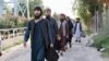 Newly freed Taliban prisoners leave a Kabul prison. The son of the late Taliban spiritual leader Mullah Mohammad Omar has been described as a relative moderate who favors a negotiated end to the war.