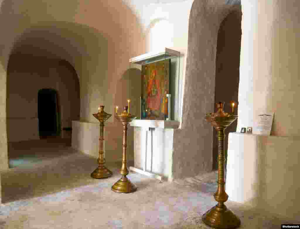 The famous Sicilian icon behind glass inside the chalk pillar. The expansive temple -- which has several stories -- has been managed by the Divnogorye Museum-Reserve since the collapse of the Soviet Union in 1991. In 2015, the museum&#39;s management began the process of getting the temple listed as part of a UNESCO World Heritage Site. But that application is in jeopardy after an Orthodox diocese applied to manage the temple. A 2010 law allows the Russian Orthodox Church to apply for ownership of state-owned religious properties. 