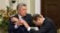 Ukraine -- Opposition Party leader Yuriy Boyko (L) and leader of Radical Party Oleh Lyashko scuffle during a meeting of parliament faction leaders in Kyiv, November 14, 2016