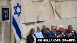 Israeli Prime Minister Benjamin Netanyahu (L), delivers his speech next to Israeli President Reuven Rivlin (R), at the opening of the winter session of the Knesset (Parliament) in Jerusalem, Israel, 23 October 2017.