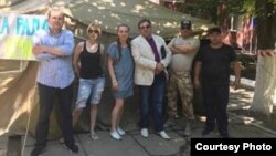 Протест чарасында катнашучылар
