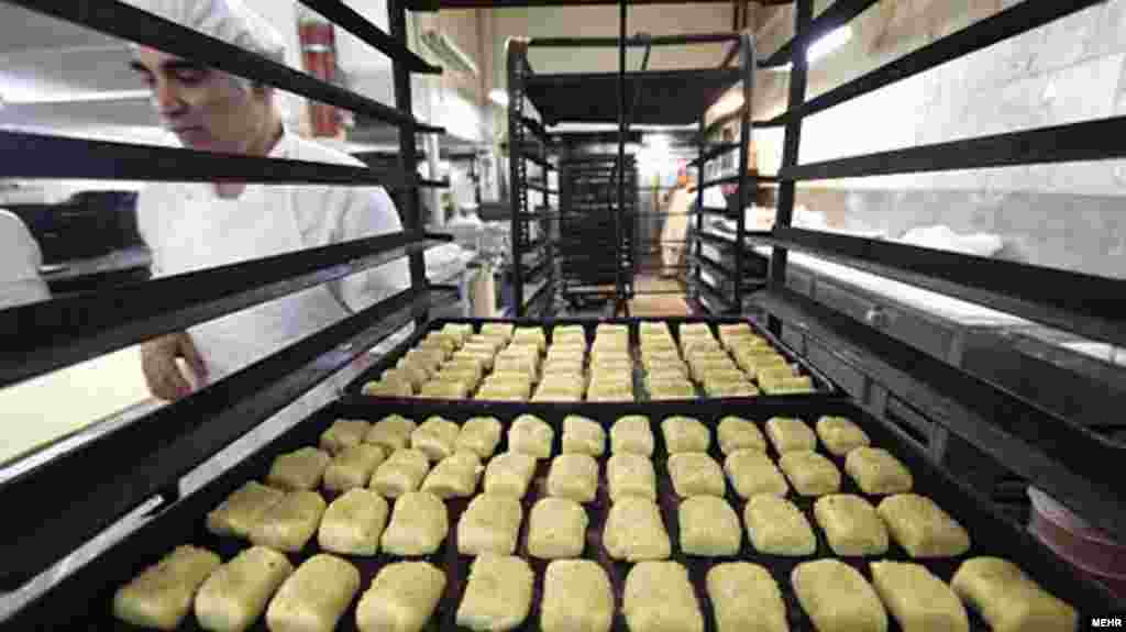 Iran -- Baking cakes and sweets in oldest confectionary in Tehran, undated  
