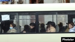 Armenia - Passengers on a commuter bus in Yerevan, March 12, 2021.