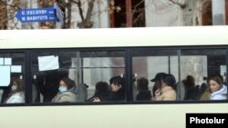 Armenia - Passengers on a commuter bus in Yerevan, March 12, 2021.