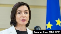 Moldovan Prime Minister Maia Sandu speaks during a briefing in Chisinau on June 13.