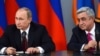 Armenia - President Serzh Sarkisian (R) and his Russian counterpart Vladimir Putin at a news conference in Yerevan, 2Dec2013.