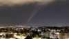 An anti-missile system operates after Iran launched drones and missiles toward Israel, as seen from Ashkelon, on April 14.