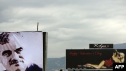 A billboard shows a picture of assassinated prime minister Rafiq Hariri.