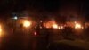 Dozens of protesters gathered outside the Iranian Consulate in Karbala on May 9, setting fire to the perimeter wall, a gate, and trailers outside.