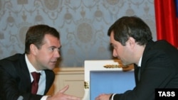 Surkov (right) huddling with Medvedev back when the latter was just a lowly first deputy prime minister.