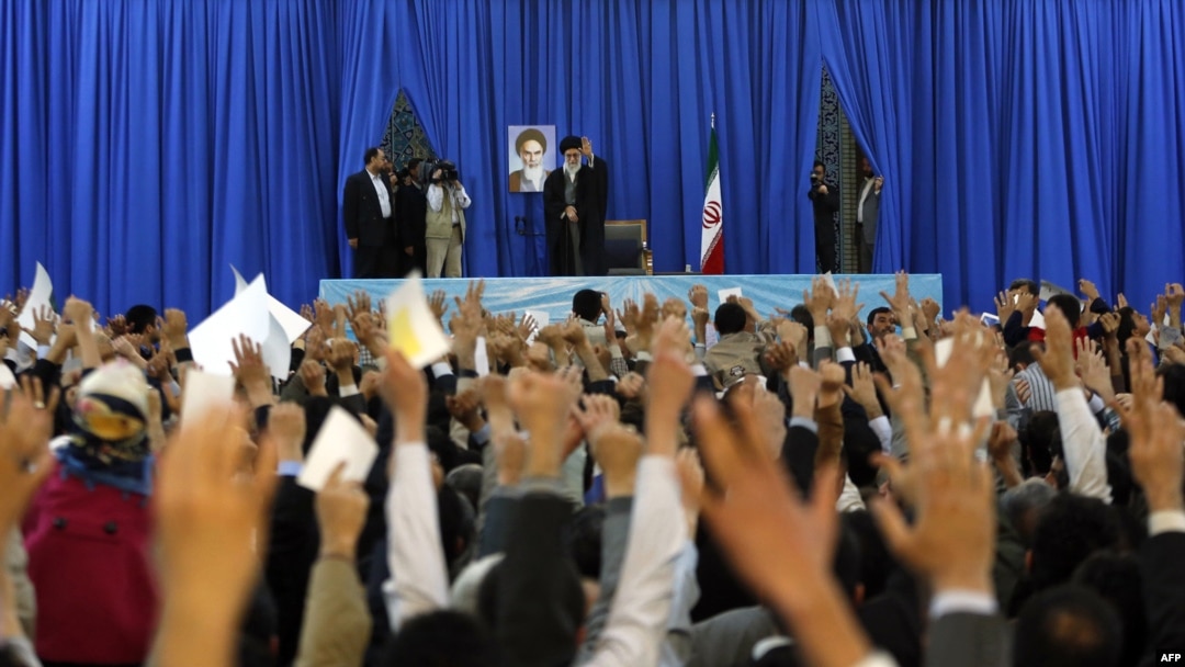 Iranian Supreme Leader Ayatollah Ali Khamenei waves to the crowd before addressing thousands of people for Norouz in the the holy city of Mashhad on March 21.