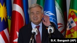 U.N. Secretary-General Antonio Guterres, left, listens to a reporter during a news conference at the Foreign Ministry in Islamabad on February 16.