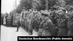 German and Red Army soldiers attend parade in Brest following the invasion of Poland in September 1939.