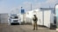 Uzbek soldiers set up a new mobile hospital for coronavirus patients on a military base in Samarkand on May 28.