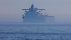 The Panama-flagged vessel Eventin off the shore of Sassnitz, Germany, on April 16. If the United States imposes new sanctions on Russia, one aim could be to lessen its oil export revenues by targeting a "shadow fleet" of vessels that help fund Moscow's war on Ukraine.