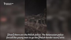 Migrant Says Belarusian Police 'Forcing Us' To Cut Polish Border Fence