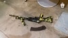 In this photo taken from video released by the Investigative Committee of Russia on March 23, a Kalashnikov assault rifle lies on the ground at the Crocus City Hall concert venue after the attack.