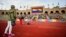 Demonstrators raise rainbow flags at Stockholm's Olympic Stadium during a protest over a controversial Russian law banning gay "propaganda." Some athletes attending the upcoming Winter Olympics in Russia have also pledged to denounce the legislation even though explicit political statements are forbidden by the Olympic Charter. 