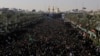 Iraqi Shi'ite Muslim pilgrims gather during the Arbaeen religious festival in Karbala on December 13. 